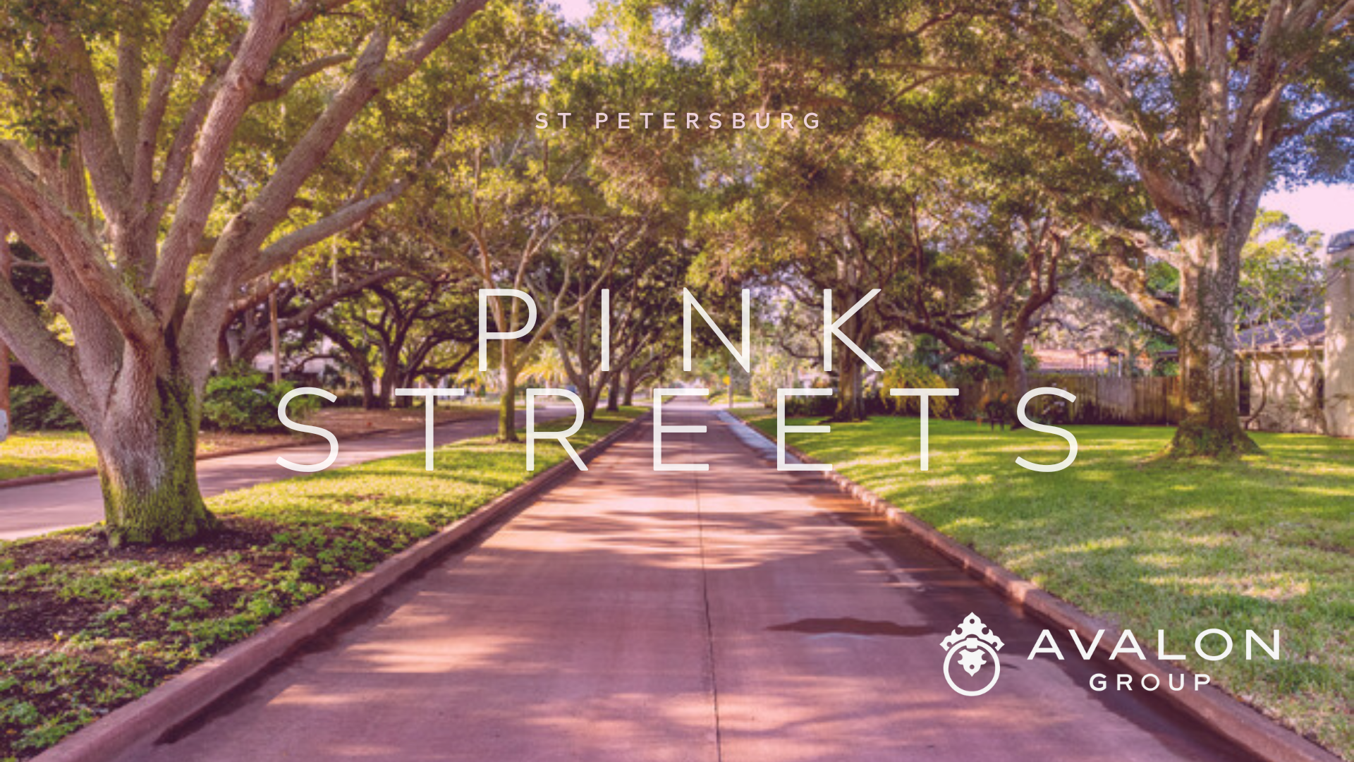 Pink Streets are in the picture with homes in the background.