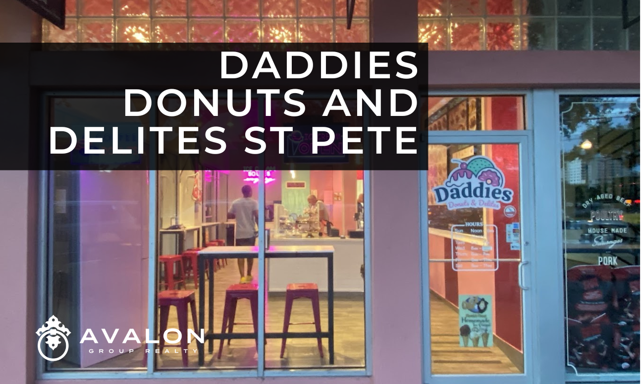 Daddies Donuts and Delites St Pete picture shows the front of the store that is painted pink with gray windows.