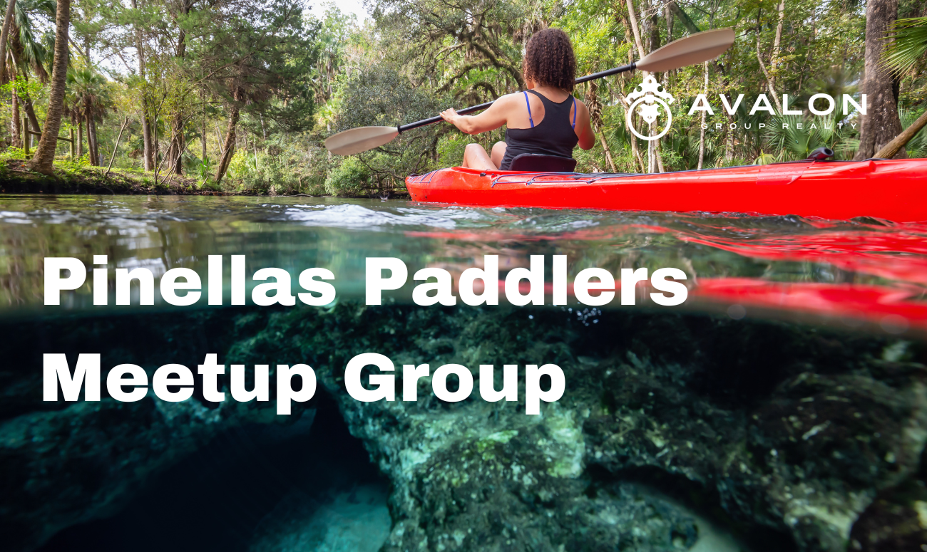 Pinellas Paddlers Meetup Group cover picture shows a woman in a black bathing suit in a red kayak. Part of the photo is underwater and the water is teal blue.