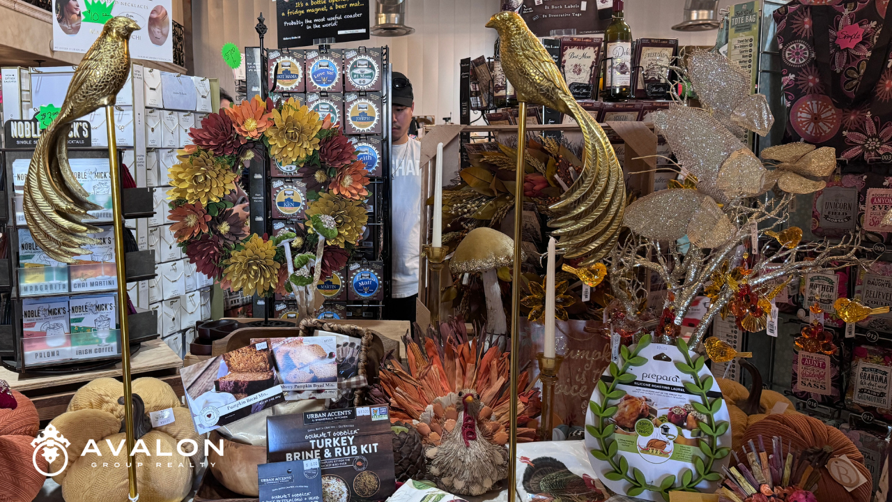 Casa di Mazzaro Kitchen Supplies St Pete picture shows a table of Thanksgiving table decor.  Two brass birds that sit atop brash poles that are 32" tall.