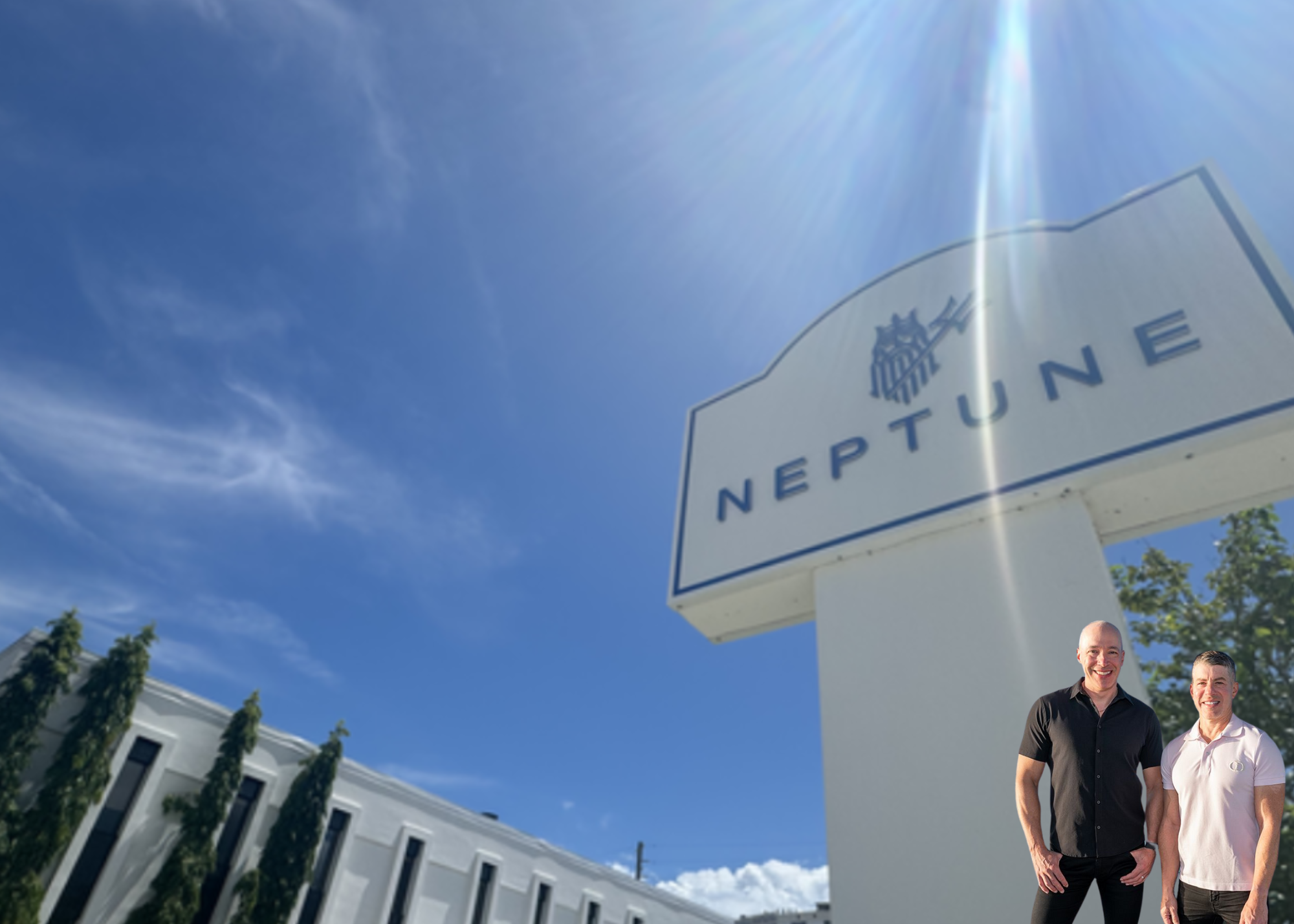 Most Expensive Condo: Trever and Gary pictures with Neptune Flood Insurance Headquarters.