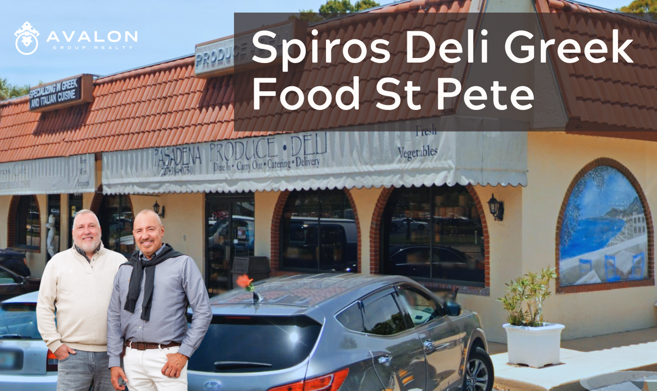 Spiros Deli Greek Food St Pete picture shows the store from the parking lot with cars parked in front.