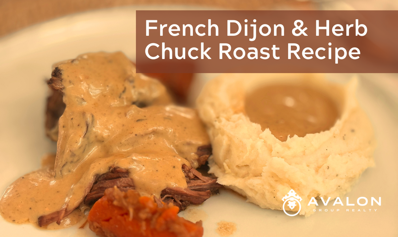 St Pete Test Kitchen French Dijon & Herb Chuck Roast Recipe picture shows a dinner plate with the roast, gravy, carrots and mashed potatoes.