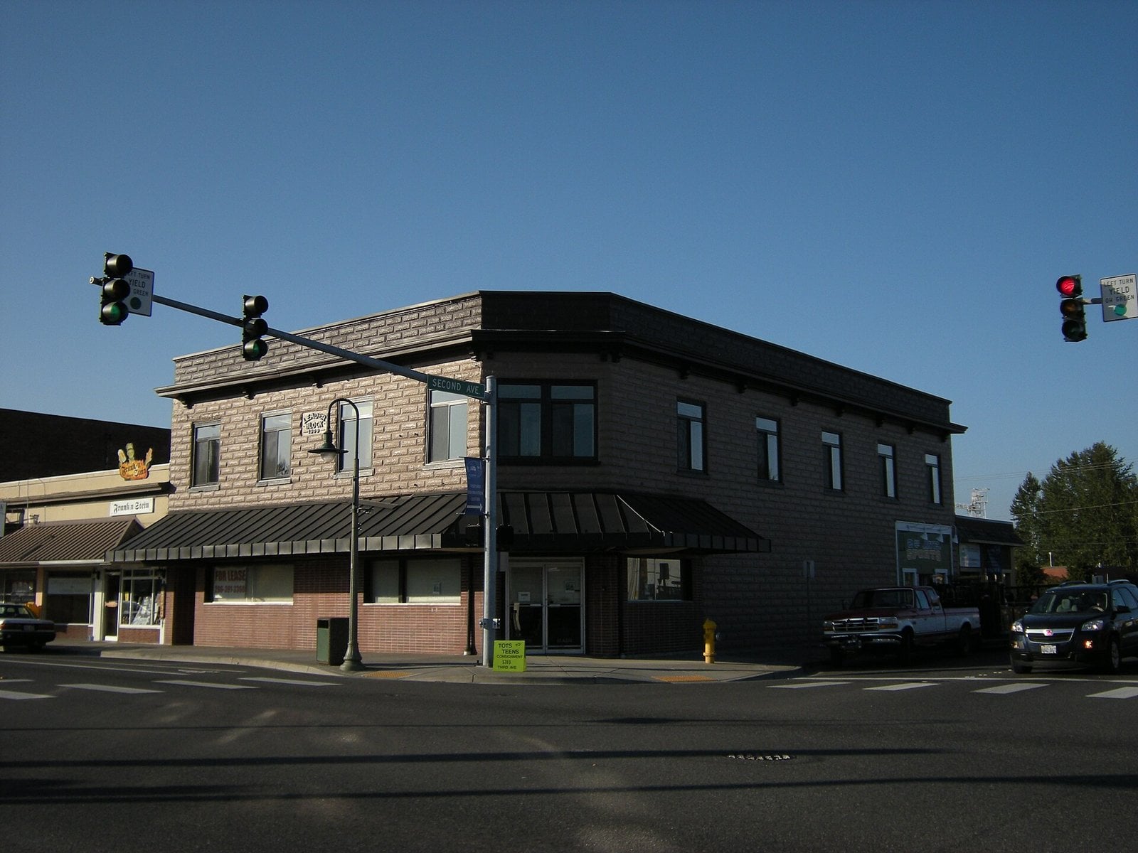 Historic Leader Block building on a street corner in Ferndale, Washington