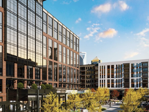 Outdoor courtyard plaza at The Iron District mixed-use development connecting Uptown and South End Charlotte.