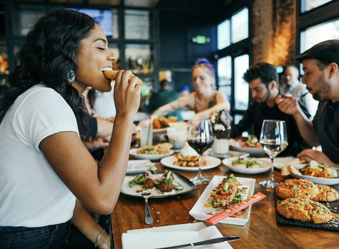 People dining at restaurants in The Iron District mixed-use neighborhood in Charlotte NC.
