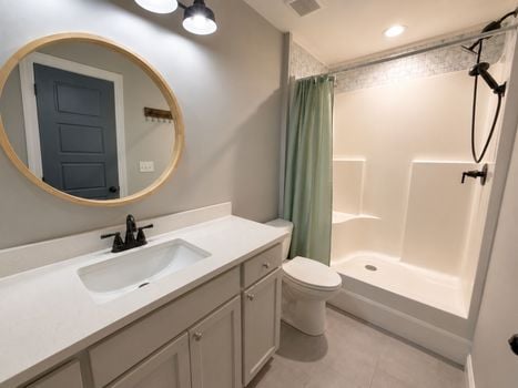 Primary bathroom with walk-in shower and contemporary vanity in Chester South Carolina home.