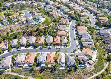 Gated entry and landscaped streets at Bear Brand JM Peters