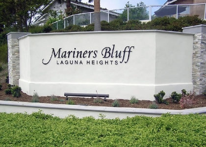 Laguna Heights single-family homes with landscaped yards in Laguna Niguel, California