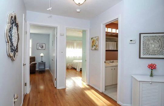 Extra wide 2nd floor hallway with hardwood floors