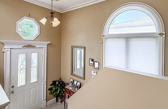 Front entry with custom window and moldings 428 Lenevar Ave