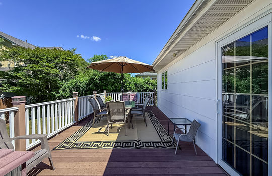 Trex Deck with sliders to the primary bedroom