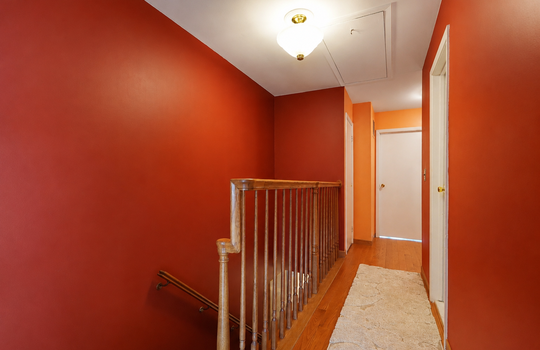 Second-floor hallway of three-bedroom Stonegate condo in Grasmere Staten Island