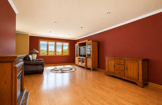Spacious living room with hardwood floors and natural light in Grasmere condo
