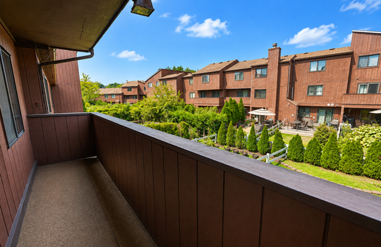 Covered balcony overlooking the Stonegate condominium community in Grasmere Staten Island
