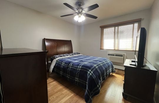 Primary bedroom in two-bedroom co-op at 3747 Amboy Road Unit 1B.