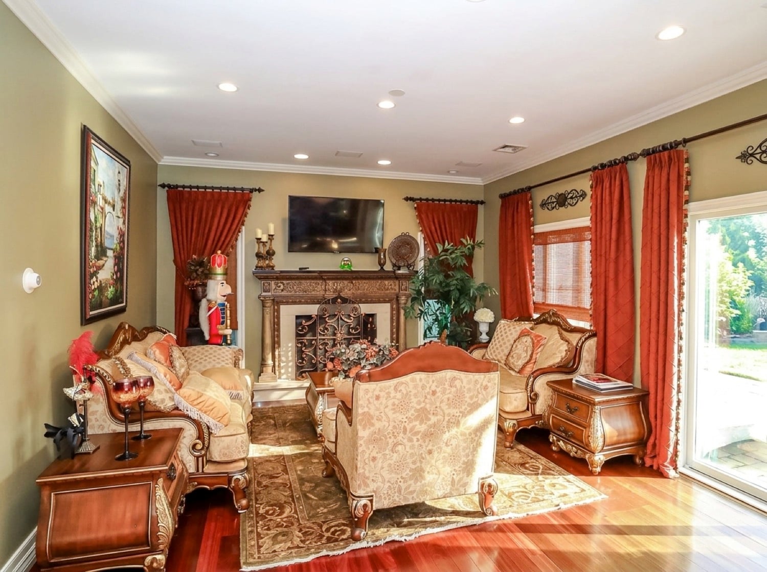 Family room at 34 Fayann Lane with Brazilian mahogany floors, marble gas fireplace and custom wet bar