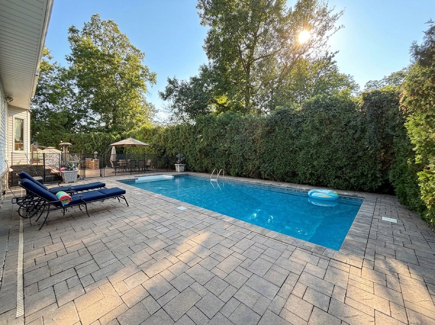 Private in-ground swimming pool and patio at 34 Fayann Lane in Tottenville, Staten Island