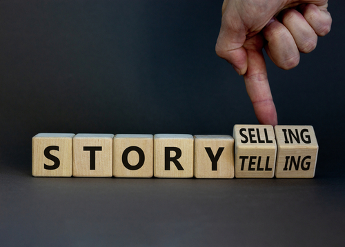 Storytelling,Or,Storyselling,Symbol.,Businessman,Turns,Wooden,Cubes,And,Changes