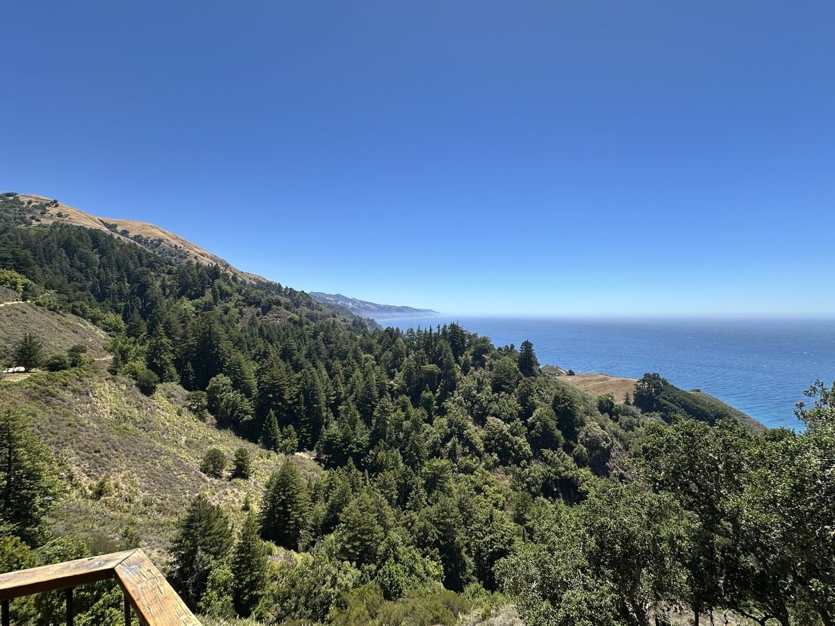 Golden hills rolling down to the ocean on the Big Sur coast