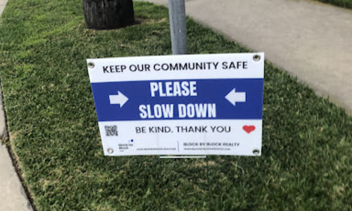 “Slow Down” yard signs available by Block …