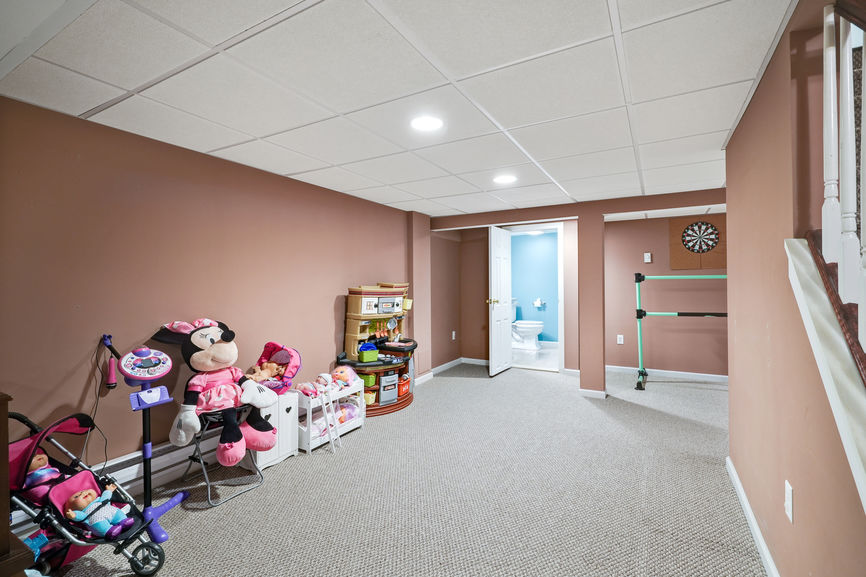 Rec room and powder room in basement