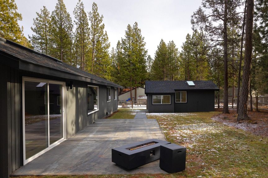 Large backyard with RV hookups and outdoor living area in remodeled home for open house in Valhalla Heights, Bend, Oregon