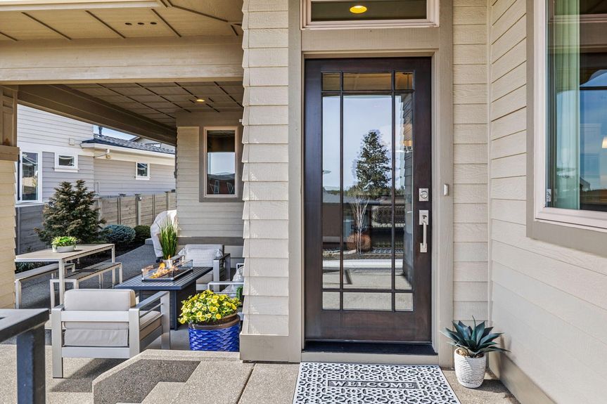 Front patio with fire pit and mountain views in Bend Oregon home
