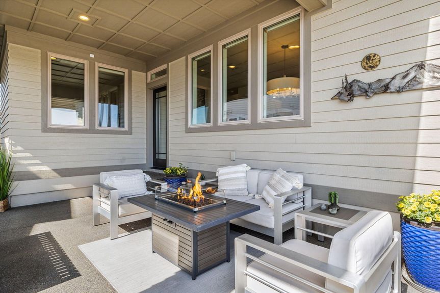 Front patio with fire pit and mountain views in Bend Oregon home