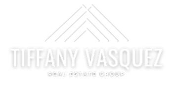 Logo of Tiffany Vasquez Real Estate - Featuring stylized mountains and river reflecting Bend, Oregon's landscape, symbolizing expertise in Bend and Central Oregon real estate market.
