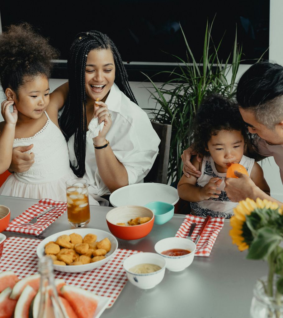 Family mealtime in the perfect family home