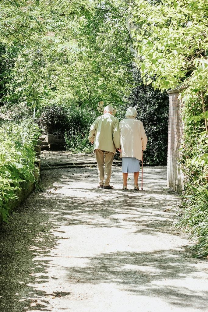 Retired couple in green garden