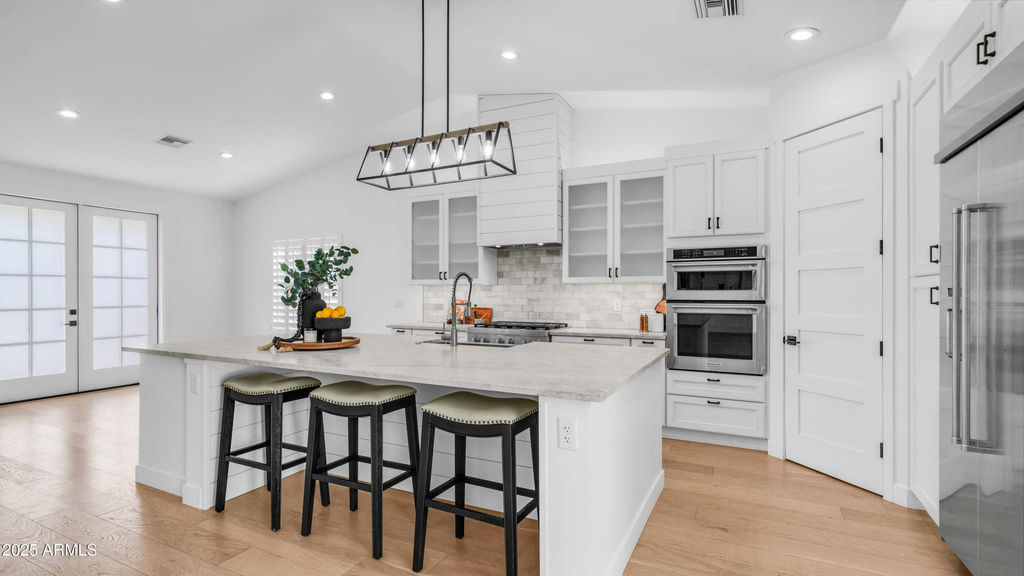 Modern Mesa AZ kitchen design with warm wood tones and natural light