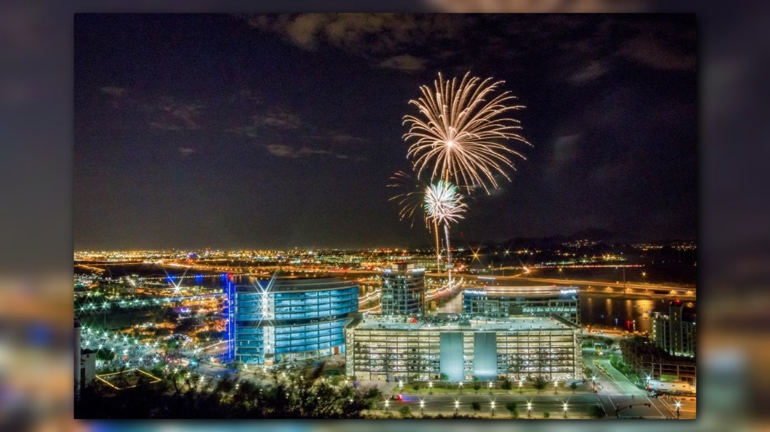 Colorful New Year’s Eve fireworks illuminating the sky over the East Valley.
