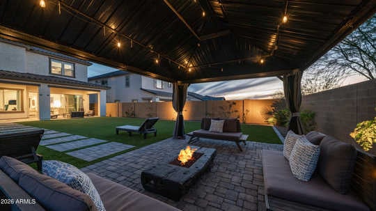 Las Sendas Mesa Arizona home backyard with covered outdoor living space