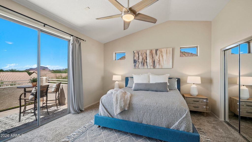 Primary bedroom with private balcony
