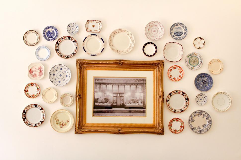 group-of-plates-hanging-on-a-wall
