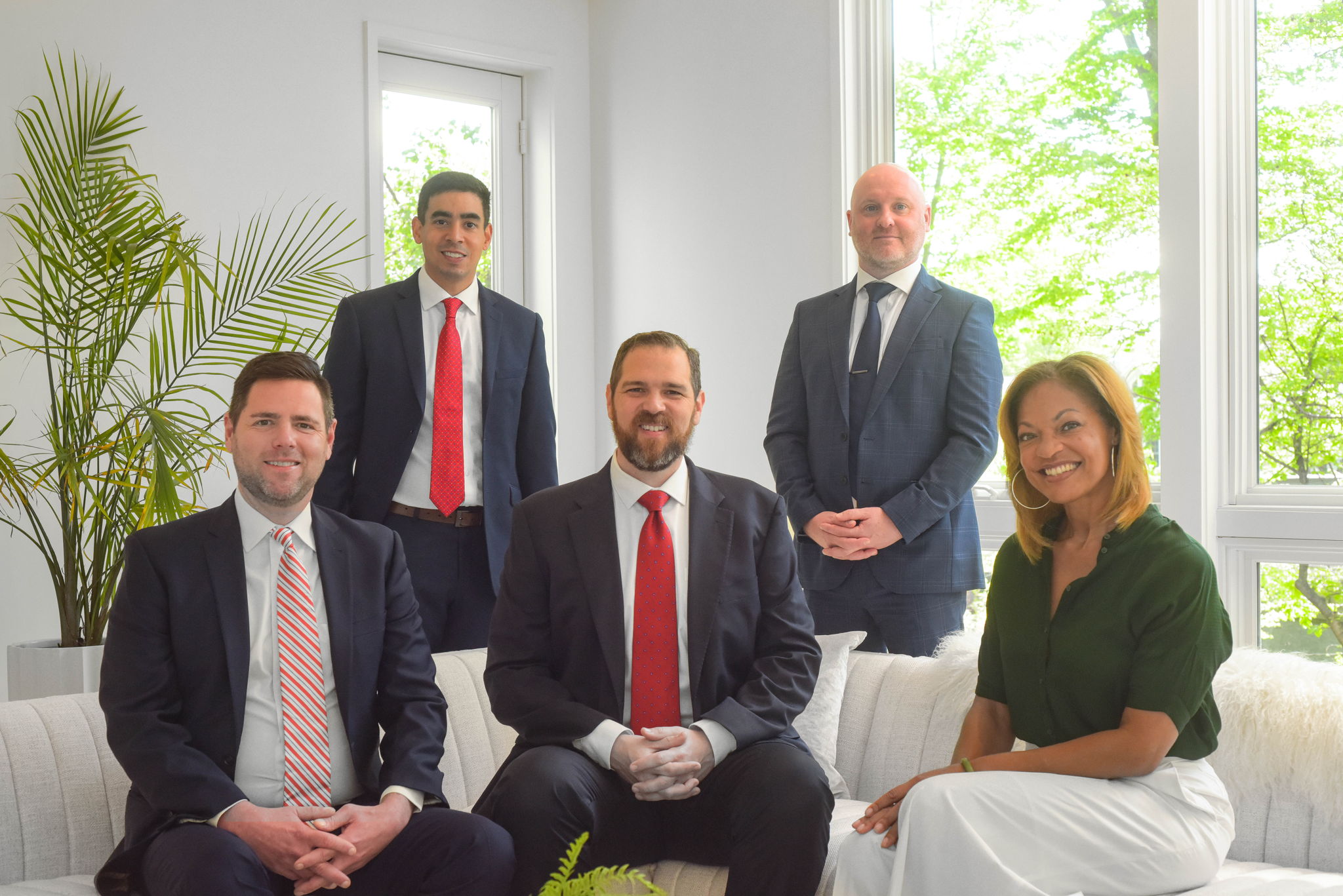 Photograph - The Slavis Group team members sitting