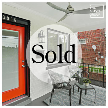 Photograph - A property with the text "sold" in the center