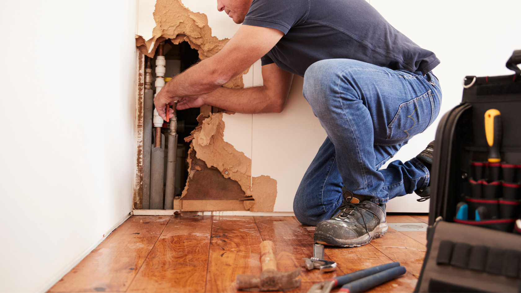 Photo: A man making repairs