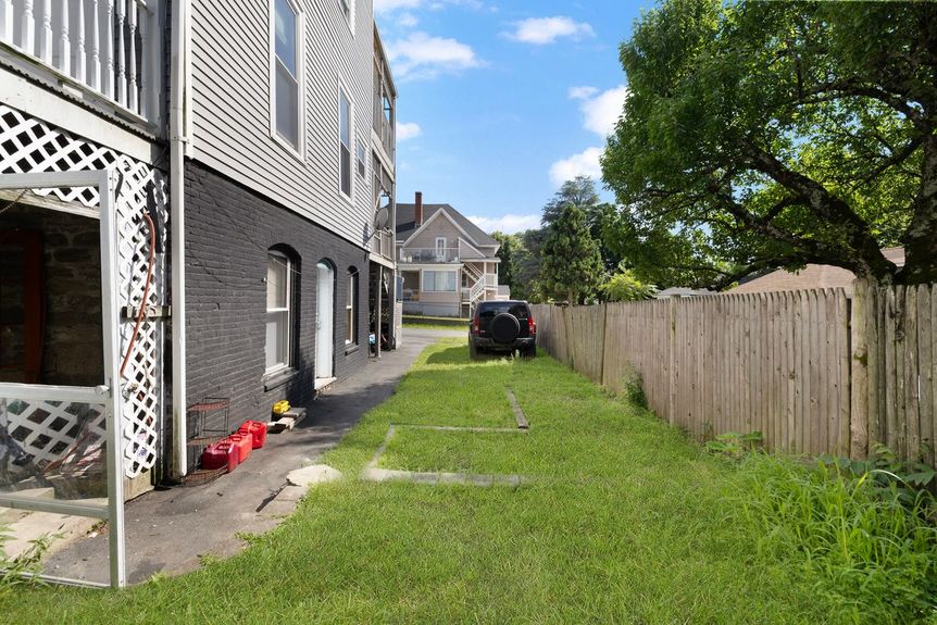 311-elm-street-woonsocket-ri-back-exterior-alexander-parmenidez-realtor-coldwell-banker-realty-2