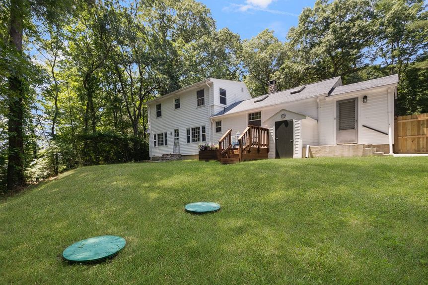 Rear exterior at 15 Williams Road, Smithfield, RI, listed by Alexander Parmenidez, Coldwell Banker Realty.