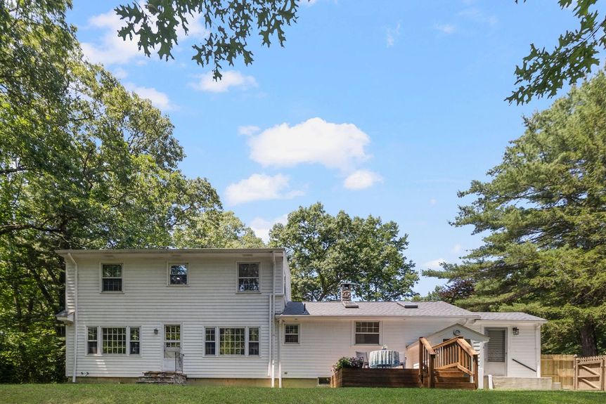 Rear exterior at 15 Williams Road, Smithfield, RI, listed by Alexander Parmenidez, Coldwell Banker Realty.