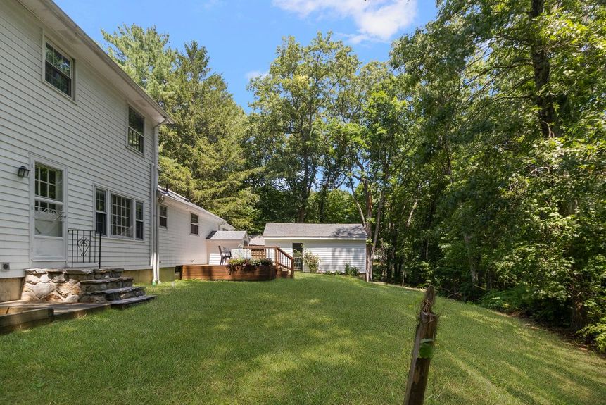 Rear exterior at 15 Williams Road, Smithfield, RI, listed by Alexander Parmenidez, Coldwell Banker Realty.