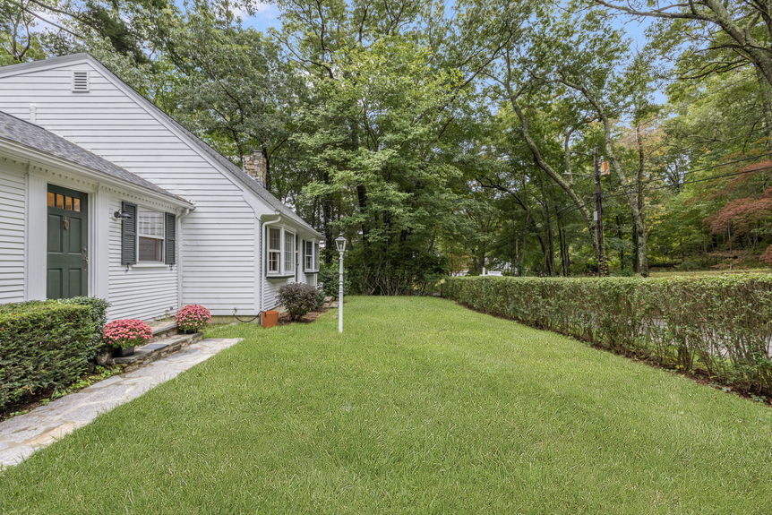 Front Yard at 15 Williams Rd, Smithfield RI, listed by Alexander Parmenidez, Coldwell Banker Realty.