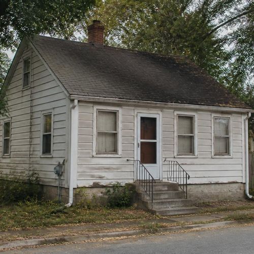 Cómo Vender una Casa con Violaciones del Código de Construcción en Rhode Island