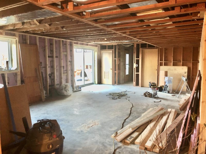 Construction site in Omaha with framing materials and lumber