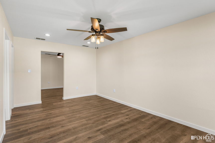 Empty room corner with ceiling fan and recessed lighting in Jacksboro home, with hardwood-style flooring