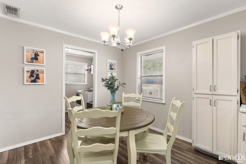 Intimate dining area with natural light and stylish furnishings.