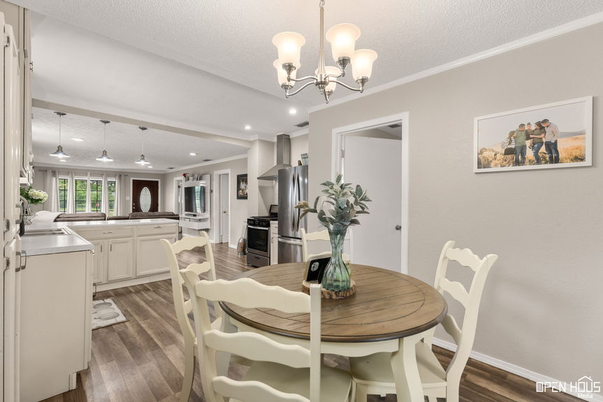Open plan view showing the kitchen and living room in a modern home setup.